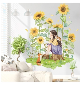 Detail showing a sunflower wall sticker with a girl and animals in a modern living room