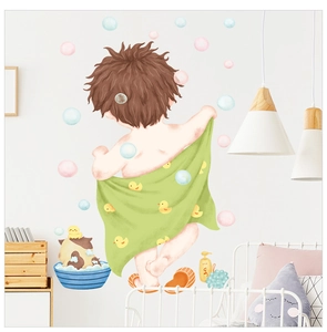 Detail view of cartoon boy bathroom wall stickers with bubbles and cute cat on nursery wall