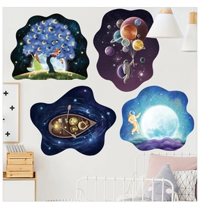 Detailed view of 3D galaxy wall decals showing astronauts and dreamlike trees in a bedroom
