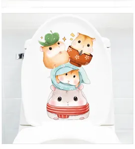 Detail of cute cartoon hamster stack stickers on a white toilet lid for bathroom decor