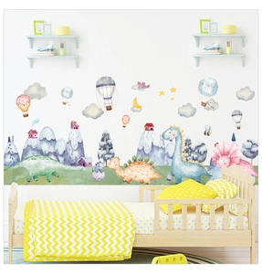 Detail view of watercolor dinosaur wall stickers on a clean white wall in a nursery room