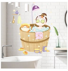 Detail of cute cartoon wall sticker with girl and cat in bathtub on white tiled bathroom wall