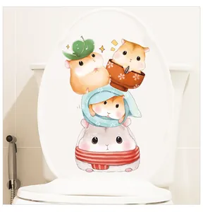 Detail of cute cartoon hamsters waterproof toilet sticker on a white ceramic lid
