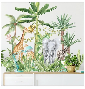Detail of tropical rainforest wall decals featuring watercolor giraffes and palm trees