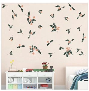 Detail of Nordic floral wall stickers with orange berries and green leaves in a kid's room