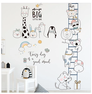 Detail of hand-drawn animal wall stickers with rainbow and inspirational nursery quotes