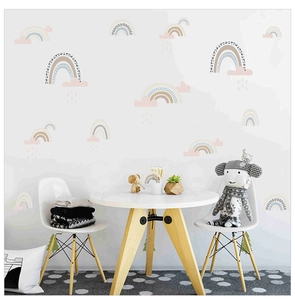 Detailed view of Morandi rainbow and cloud wall stickers in a cozy children room setting