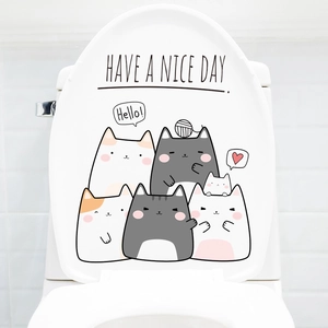 Waterproof self-adhesive bathroom toilet lid decal featuring cute cartoon cats and hearts