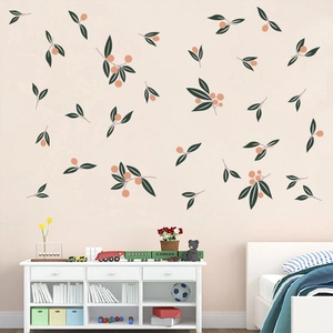 Minimalist Nordic plant wall decals with green leaves and orange berries on pink wall