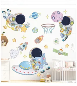 Detail of cartoon astronaut wall stickers set featuring rockets and planets for kids room