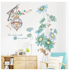 Detail of sunflower wall stickers with vintage street lamp and garden quote on white wall