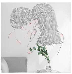 Minimalist wall sticker showing a romantic couple kissing in black and white line art