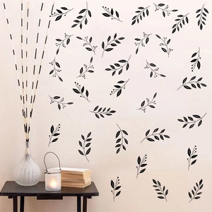 Minimalistische schwarze Blatt-Wandtattoos für eine natürliche nordische Wanddekoration