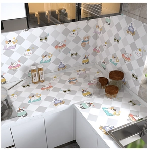 L-shaped kitchen scene with cat patterned oil-proof stickers on stove and countertop
