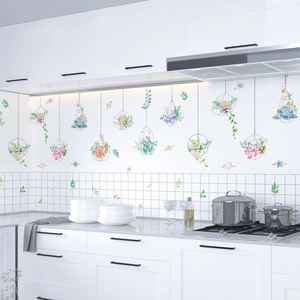 Modern watercolor kitchen wall decal with hanging succulent plants and floral design