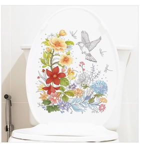 Détail d'autocollants décoratifs pour abattant de WC avec fleurs colorées et oiseaux