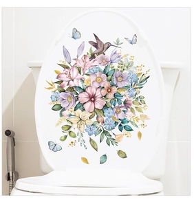 Detail view of watercolor floral toilet decal with purple lilies and a tiny hummingbird