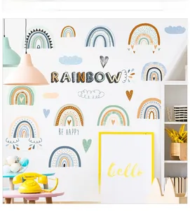Detailed close-up of rainbow wall decals with clouds and hearts in Morandi pastel tones