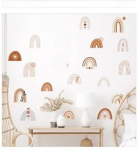 Detail of boho rainbow wall stickers in soft Morandi colors for nursery decor