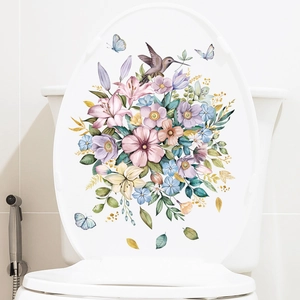 Floral toilet seat lid decal with watercolor pink lilies, green leaves and hummingbird