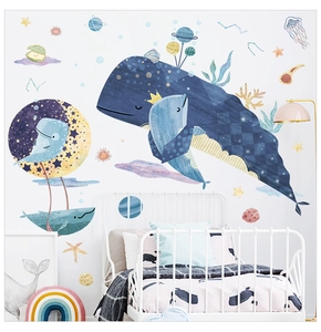 Detailed kids room wall stickers showing whales, planets and stars in a nursery room