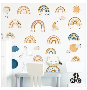 Detail of bohemian rainbow wall stickers with sun and moon for nursery decor