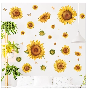 Detailed view of sunflower wall decals with butterfly and bee stickers on white wall