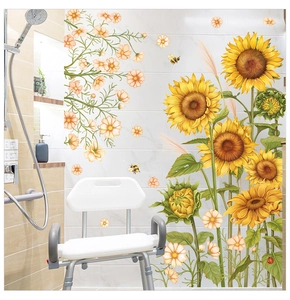 Detail of sunflower and daisy wall decals applied on bathroom marble tile walls