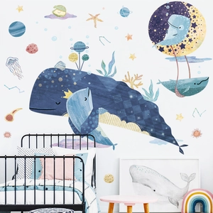 Ocean and starry whale wall decals for kids bedroom decor featuring blue constellations