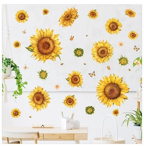 Detailed scene of sunflower wall decals with butterfly accents on a clean white wall