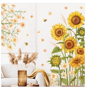 Detail of sunflower and daisy wall stickers featuring bees and ladybugs on a white wall