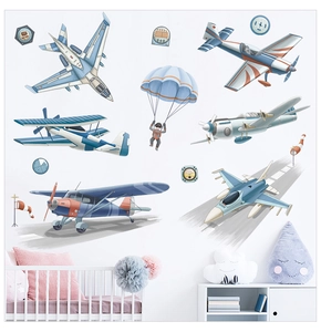 Détail de stickers muraux avec avions de dessin animé et parachutiste pour chambre
