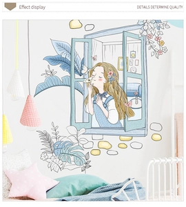 Detail of tropical plant wall decal featuring a girl sniffing flowers on a cozy window