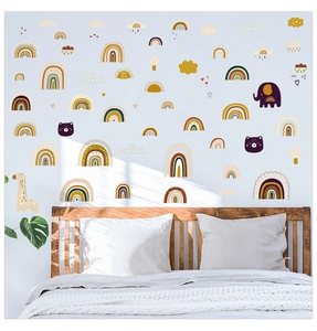 Detailed view of Morandi-style animal rainbow wall stickers in a cozy nursery bedroom