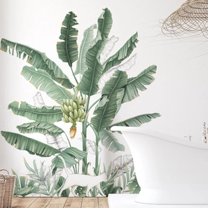 Sticker mural bananier tropical avec chat blanc pour une décoration intérieure épurée