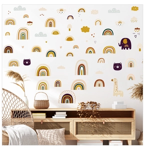 Close-up of Nordic boho rainbow wall stickers with elephant and giraffe for nursery