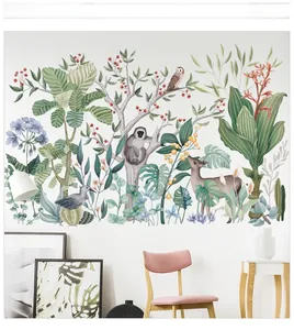 Detail view of tropical forest wall stickers with monkeys and deer in a nursery setting
