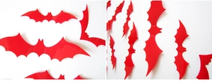 Detail of red 3D bat wall stickers with foldable wings for Halloween decor