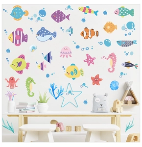 Detailed view of ocean fish wall stickers in a minimalist Nordic style children room