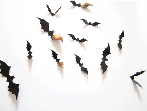 Close-up of black 3D bat wall decals made of PVC for spooky Halloween home decoration