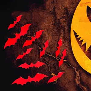 Detail of red 3D bat wall stickers on a dark rock surface for Halloween decoration