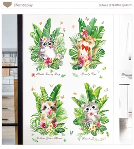 Detail showing cartoon cats with tropical green leaves and motivational English phrases