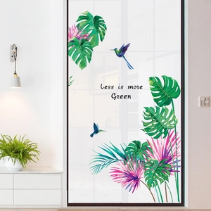 Tropical monstera leaves and hummingbird wall decals with Less is More Green text