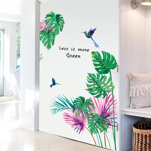 Tropical monstera leaves and hummingbird wall decals with Green text for home decor