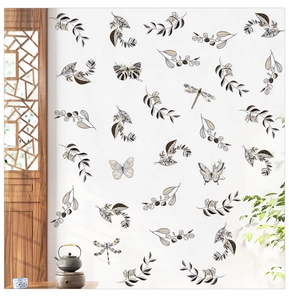 Détail de stickers muraux papillon et feuilles en style de croquis noir et doré élégant