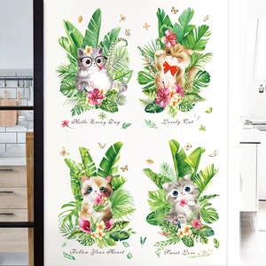 Cartoon wall stickers featuring cute cats and tropical green leaves for kids room decor