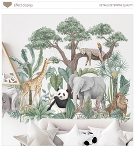 Detail of tropical jungle animal wall stickers showing a giraffe and lush green palms