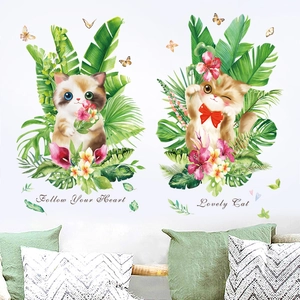 Cartoon wall decal set with cute cats, tropical leaves, and butterflies for kids room