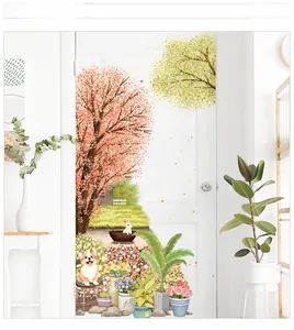 Detailed close-up of cartoon cherry blossom tree and corgi wall stickers on a white door