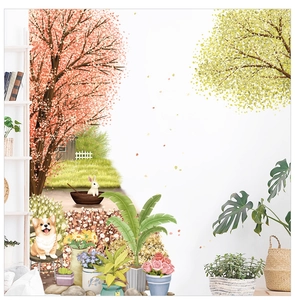 Detail of cartoon cherry blossom wall sticker with dog and potted plants on white wall